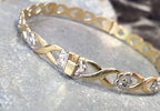 Vintage 9ct Rolled GOLD BANGLE with White Flowers - 6.9g