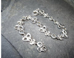 Sterling Silver Bracelet with Celtic Knot Links and Blue Stones -  7.7g