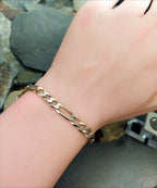 9ct GOLD CURB LINK Bracelet length 21.5cm, 6mm wide - 9g
