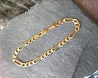 9ct GOLD CURB LINK Bracelet length 21.5cm, 6mm wide - 9g