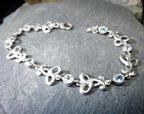 Sterling Silver Bracelet with Celtic Knot Links and Blue Stones -  7.7g