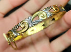 Vintage 9ct Rolled GOLD BANGLE - Beautiful Scroll with Safety Chain - 11.6g